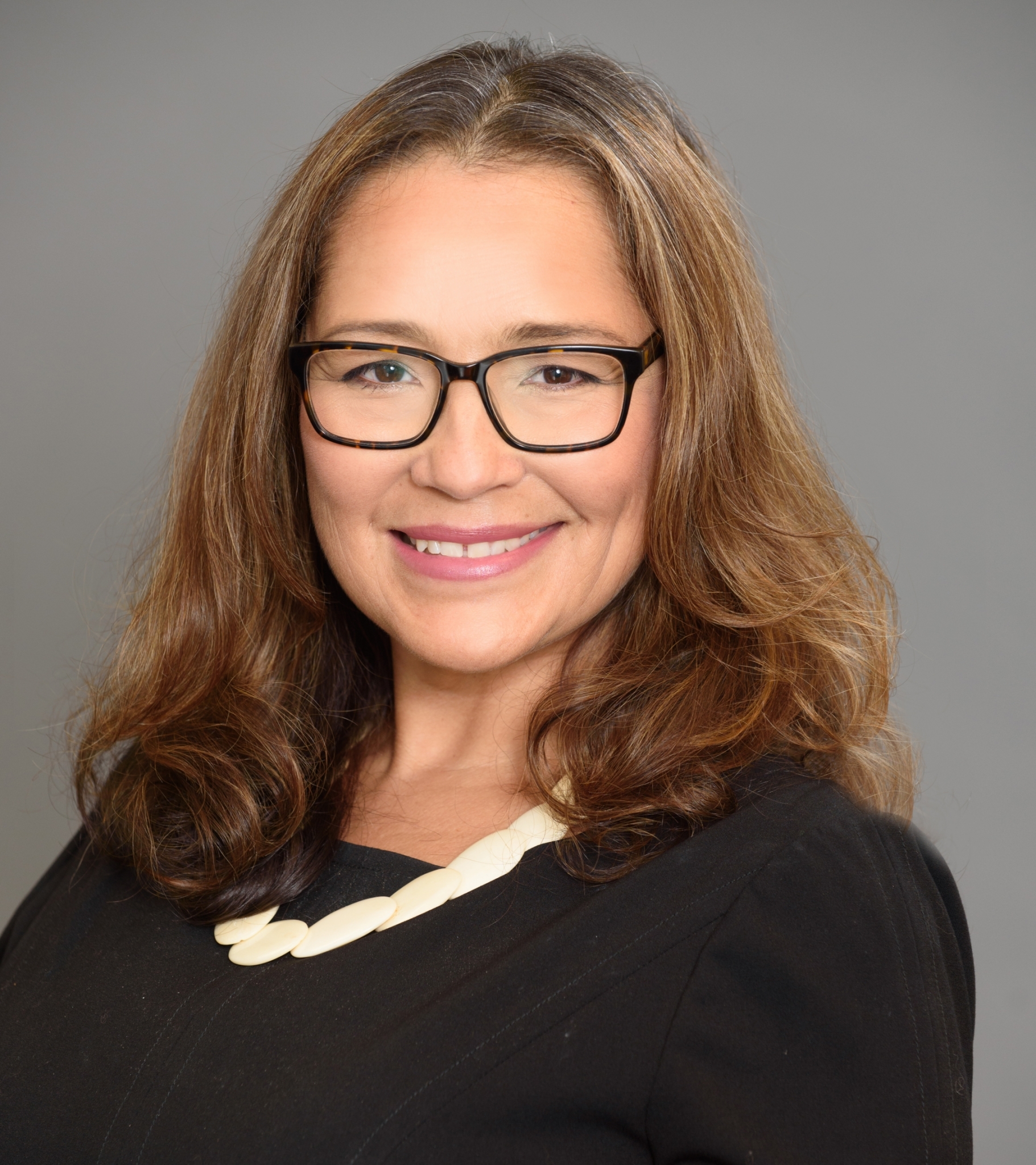 Headshot of Renee Aragon Dolese, Director of Marketing and Communications